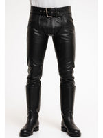 Load image into Gallery viewer, Gay leatherman wearing black leather convertible chaps pants in front view
