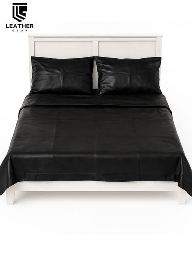 Full-grain cowhide leather bedsheet on made bed — luxury BDSM and fetish sleepwear setup by leather gear