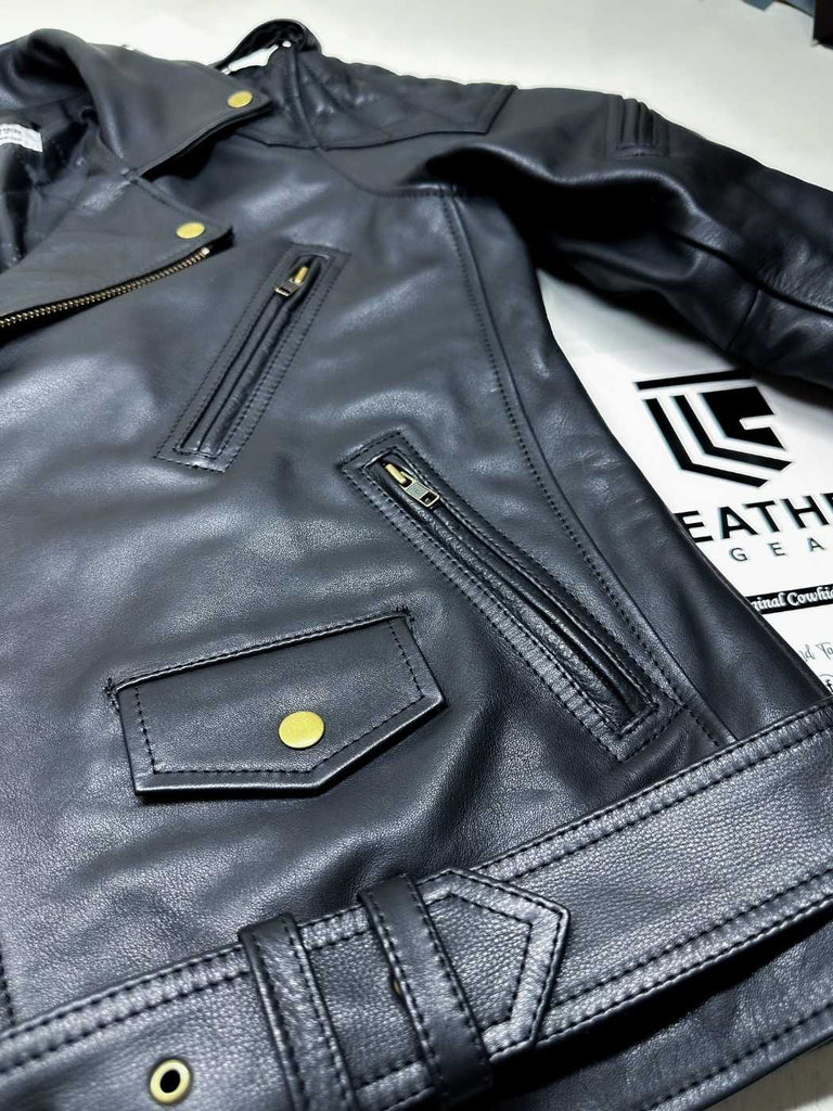 Angled front shot of gay leather police jacket with epaulettes and waist belt – BLUF uniform fashion