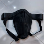 Charger l&#39;image dans la galerie, Front close-up of leather jockstrap showing full-grain cowhide texture and fetish zipper design
