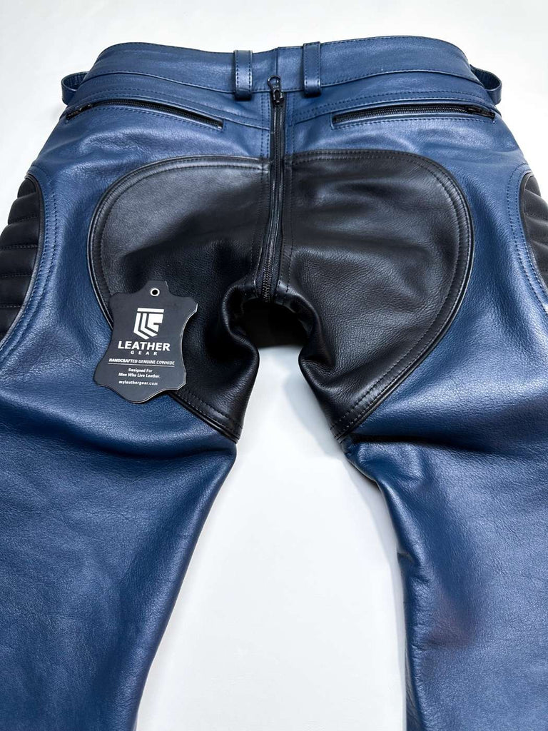 Blue leather pants with a visible brand label on a white background