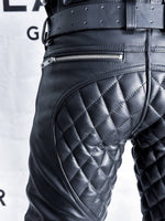 Load image into Gallery viewer, Close-up flat lay of quilted back and seat padding – leather fetish clothing for gay men and uniform lovers
