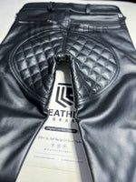 Lade das Bild in den Galerie-Viewer, Close-up flat lay of quilted back and seat padding – leather fetish clothing for gay men and uniform lovers

