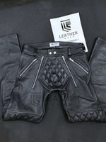 Load image into Gallery viewer, Close-up of padded codpiece on leather pants – tight fit gay fetishwear inspired by leather sailor pants and Mister Hide gear
