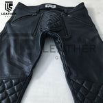 Lade das Bild in den Galerie-Viewer, Flat lay front view of leather padded pants – double zip fly and codpiece detail in black full-grain leather
