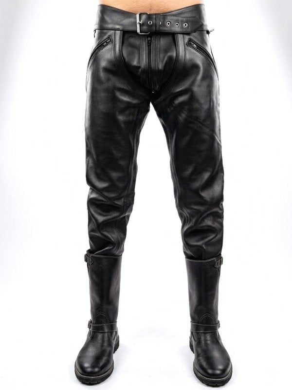 Black leather pants worn by a person on a white background