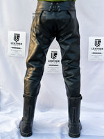 Load image into Gallery viewer, Back view of leather chaps pants with exposed rear detail and leather gear fit
