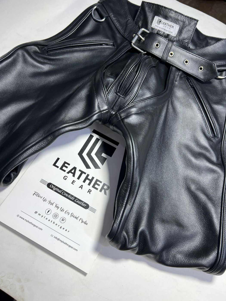 Leather fetishwear with low-rise chaps pants worn by dominant gay top