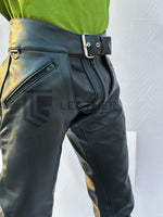 Load image into Gallery viewer, Leatherman posing in convertible fetish pants with low-rise cut
