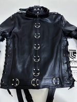 Charger l'image dans la galerie, Black leather jacket with metal buckles on a white background
