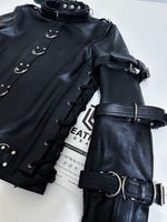 Charger l'image dans la galerie, Black leather jacket with metal accents on a white background
