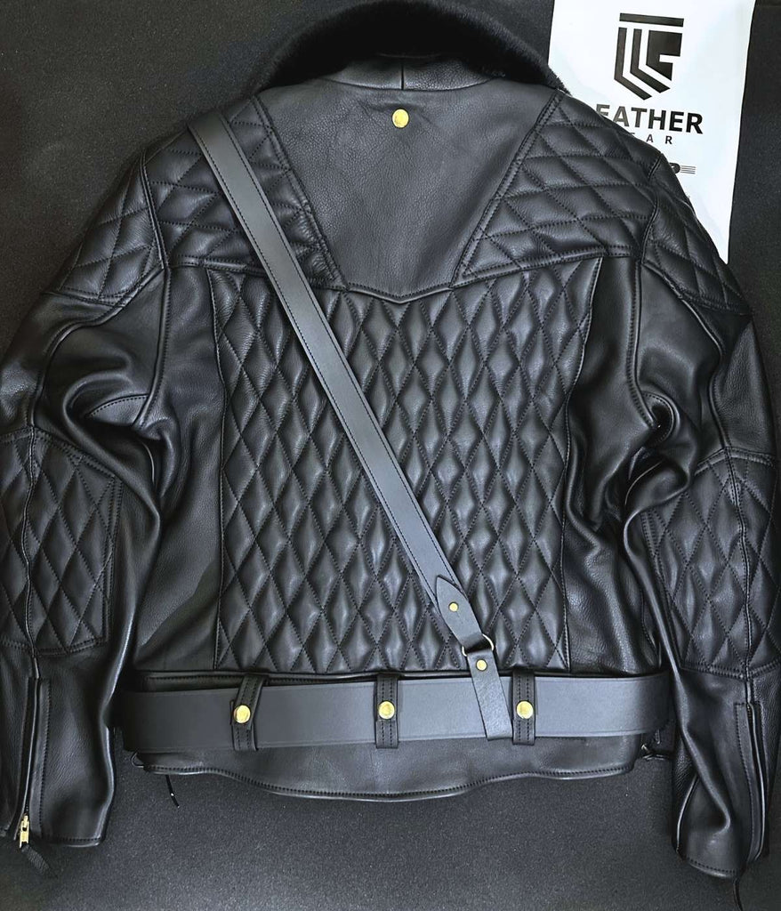 Laying flat back pose of gay leather biker uniform jacket with padded shoulders and removable fur collar by Leather gear