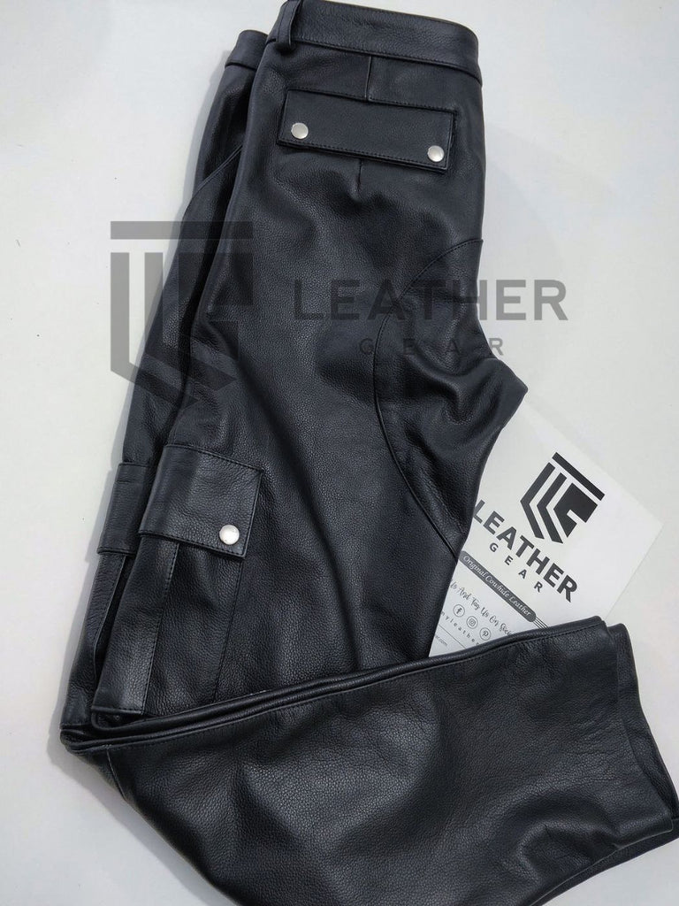 Folded side view showing dual-snap cargo pockets – leather pants men wear for fetish shop and party looks