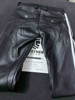 Lade das Bild in den Galerie-Viewer, Back view laid flat showing stitched seat and stripes – leather uniform pants for gay men
