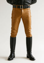 Load image into Gallery viewer, front view of Tan Leather Fetish Jeans – fetish pants with full-grain cowhide leather and five-pocket design
