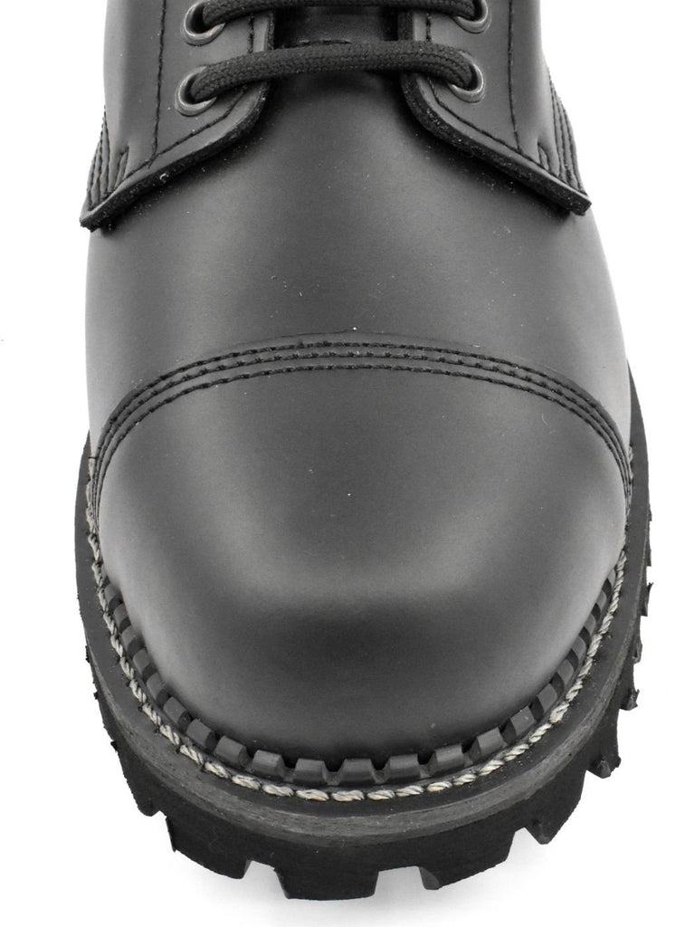 Close-up of steel toe on The 20-Hole Dominator Boots – rugged polishable leather for gay fetish and biker wear
