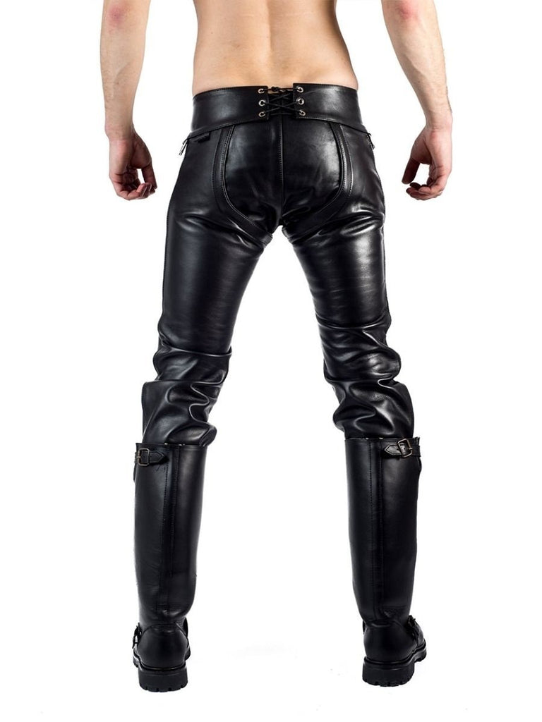 Gay leather pants unzipped to reveal black leather chaps from behind