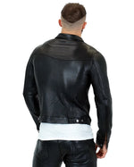 Load image into Gallery viewer, Back view of man wearing leather denim jacket – full-grain cowhide gay fetishwear
