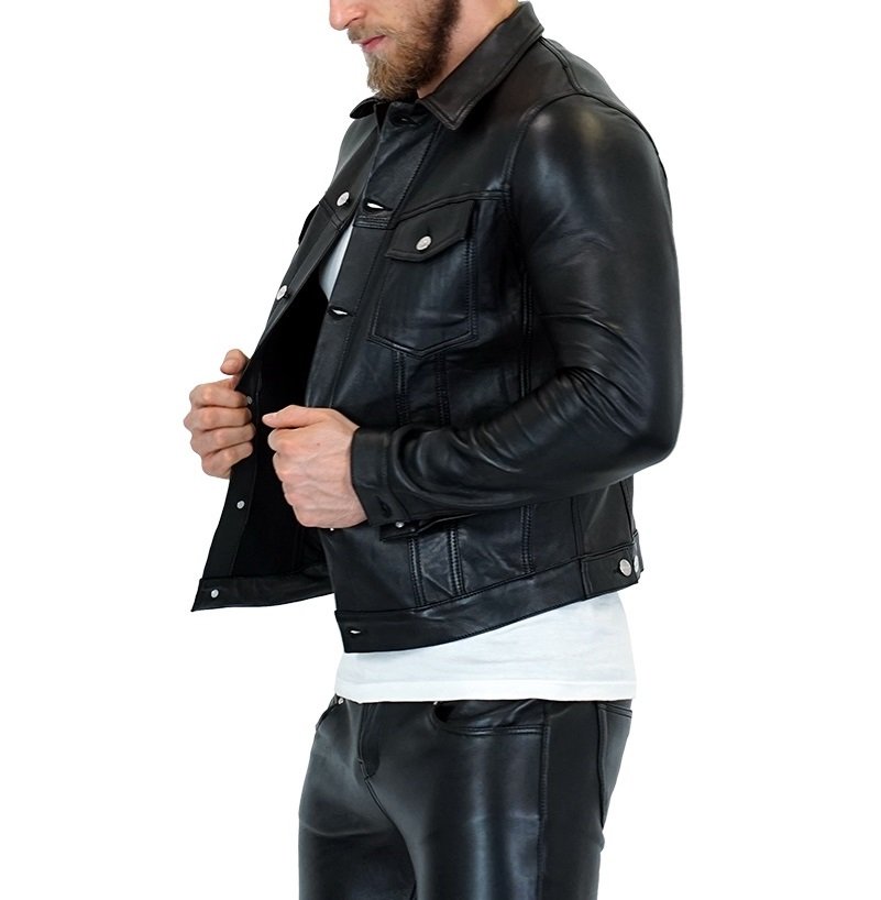 Left side view of man in black leather denim jacket – edgy gay leather fashion