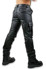 Load image into Gallery viewer, Slight back view showing ass saddle and belt loops – rugged leather uniform cargo pants for gay leather lifestyle
